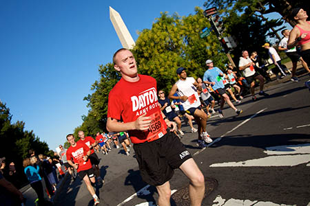 Cadet James J. Maskovyak, from the University of Dayton (Ohio) ROTC, runs along Independence Ave. in Washington, D.C., during the Army Ten-Miler.